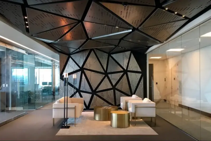 Modern office space with glass meeting rooms and open desks